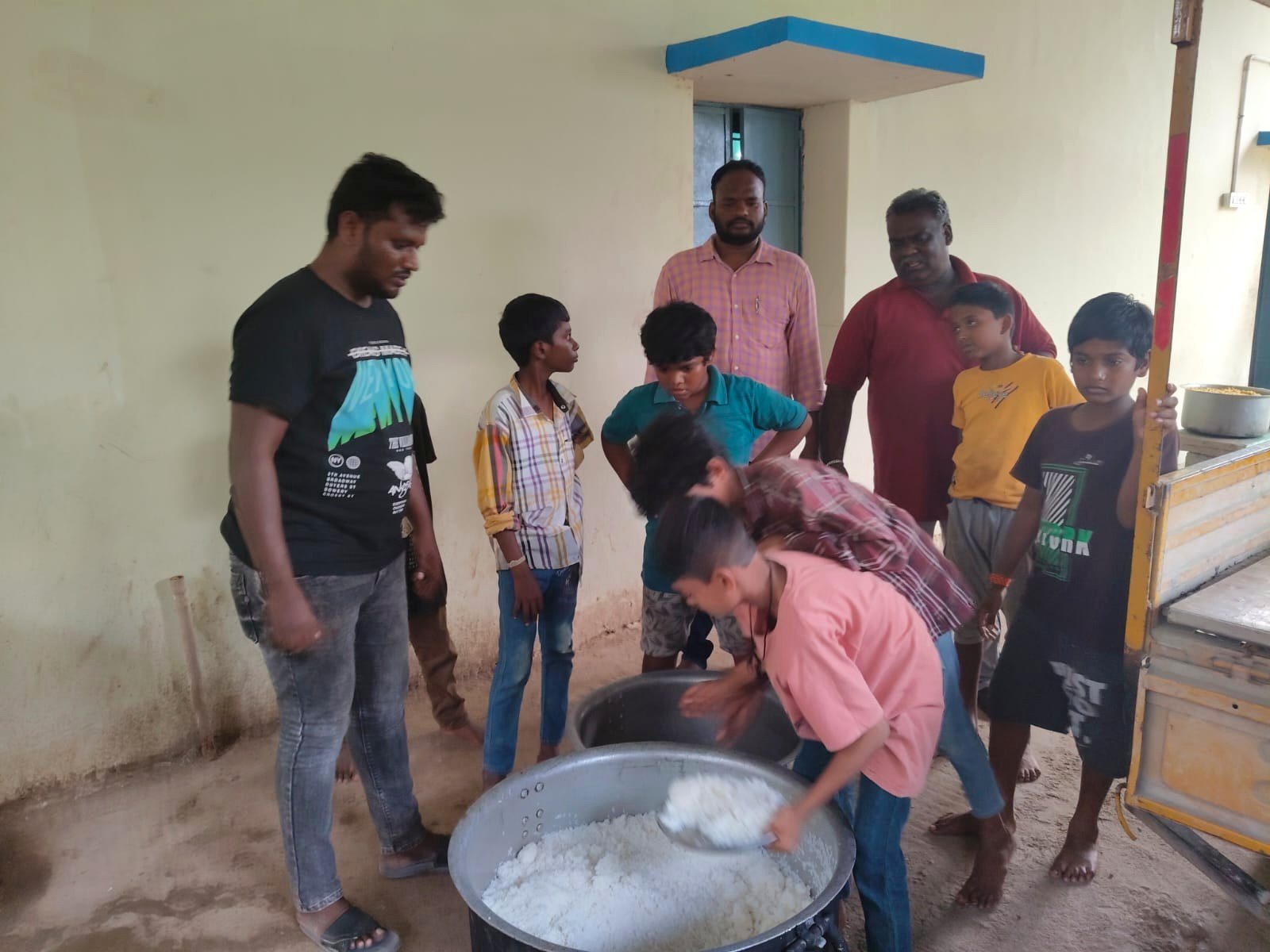 Community members at a food service activity